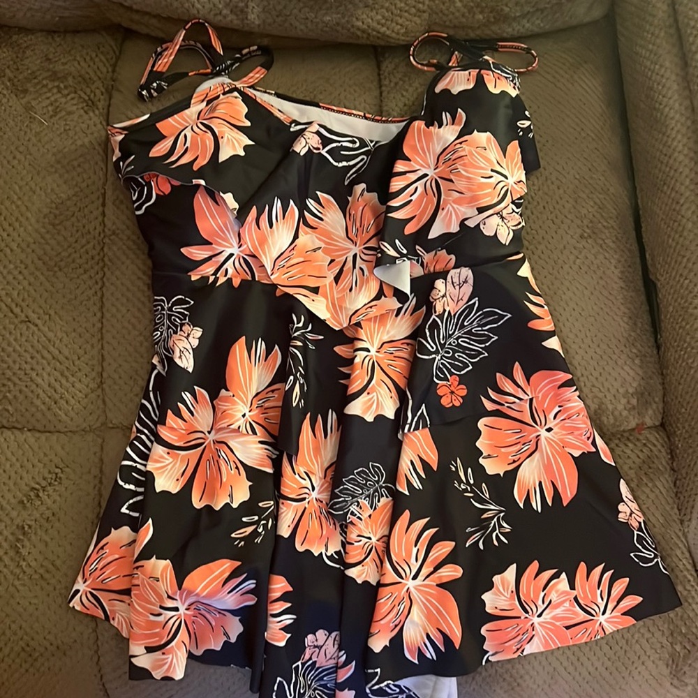 Ruffled bathing suit top.